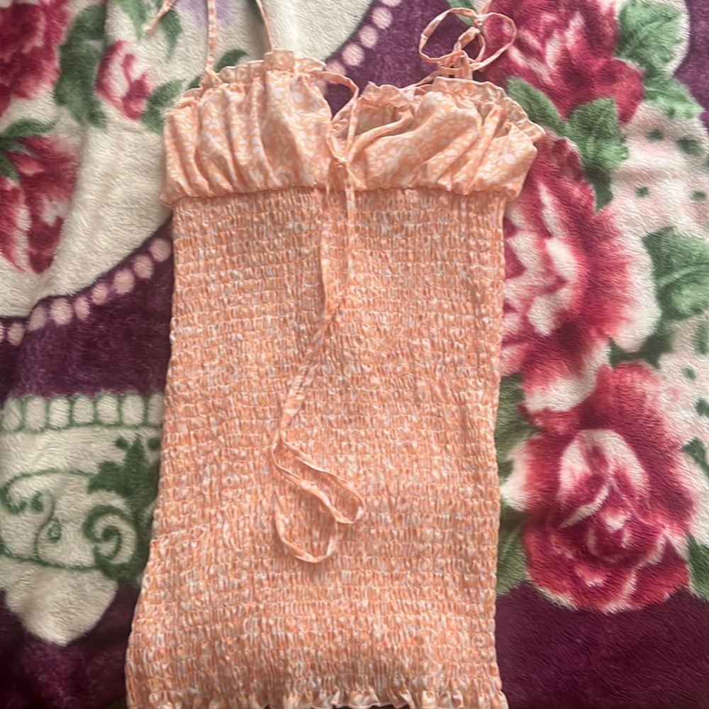 Orange mixed with white tie shoulder dress